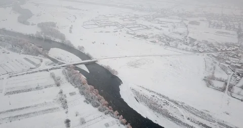 Winter river flight drone bridge over the river snowfall Stock Footage 122601583