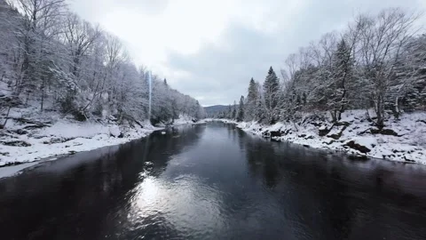 Winter River Flow in Mountain Valley Stock Footage 321624159