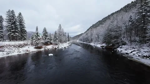 Winter River Flow in Mountain Valley Stock Footage 321624201