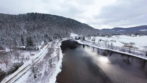 Winter River Flow in Mountain Valley Stock Footage 321624245