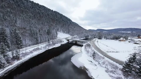 Winter River Flow in Mountain Valley Stock Footage 321624253