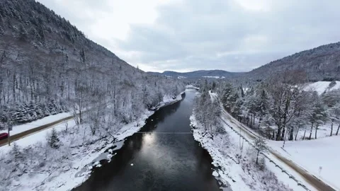 Winter River Flow in Mountain Valley Stock Footage 321624261