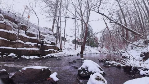 Winter River Flow in Snowy Forest – Cinematic Nature Scene Stock Footage 321983888