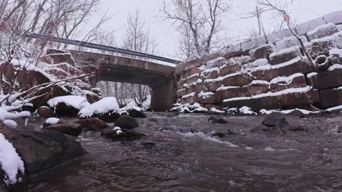 Winter River Flow in Snowy Forest – Cinematic Nature Scene Stock Footage 321983963