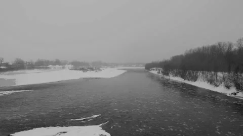 Winter river Kuban in heavy snowfall, Armavir, Russia, Krasnodar region Stock Footage 234429311