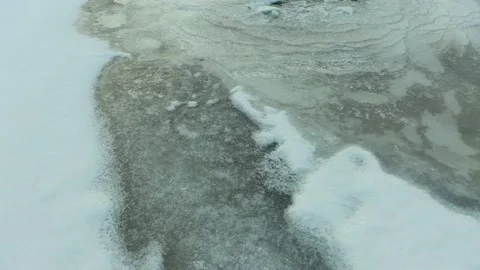 Winter river with rapids and current, flying over thawed water and flowing in 스톡 동영상 165347091