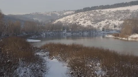 Winter river, snow on the beach. Stock Footage 82643346
