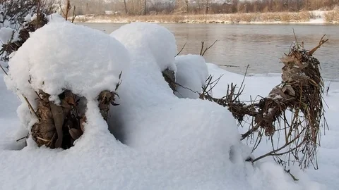 Winter river, snow on the beach. Stock Footage 82643437