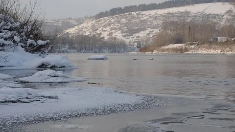 Winter river, snow on the beach. Stock Footage 82643465
