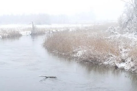 Winter river in snow Stock Photos