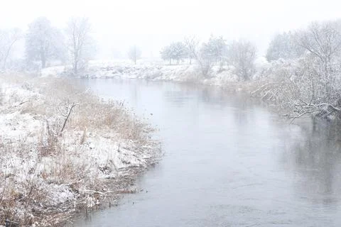 Winter river in snow Stock Photos