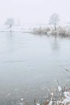 Winter river in snow Stock Photos