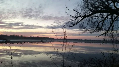 Winter river water sunset w ice and tree right 스톡 동영상 73679575