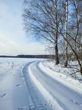 Winter Road Alongside a River Stock Photos