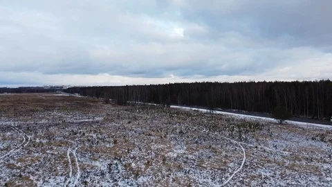 Winter road, forest, nature of Russia. City in the distance. Stock Footage 123797487