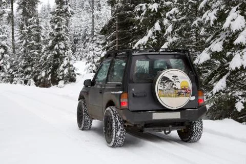 Winter off road in forest Stock Photos