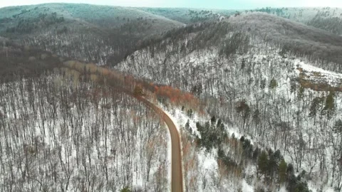 Winter road in the mountain forest Stock Footage 300278140