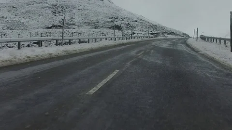 Winter Road POV from Back Window Stock Footage 77765829