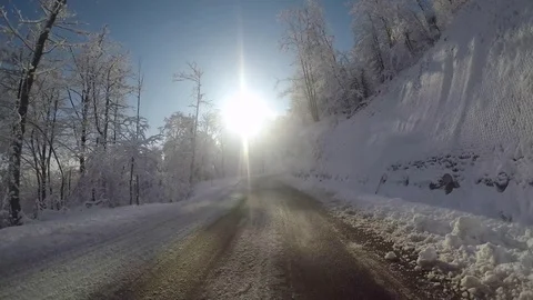 Winter road in snow in the sun Stock Footage 82500039