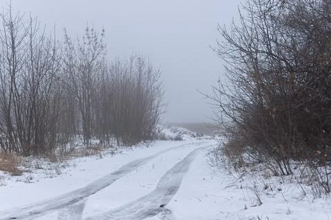 Winter road snowfall. Stock Photos