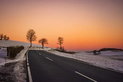 Winter Road at Sunset Stock Photos