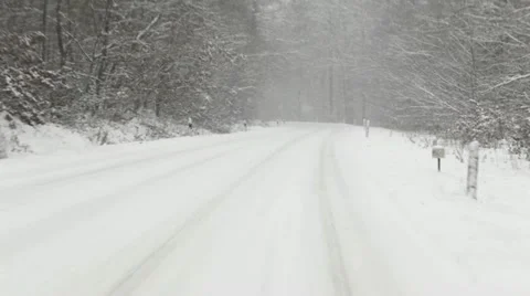 Winter road through the forest - timelapse Stockbeeldmateriaal 12763653