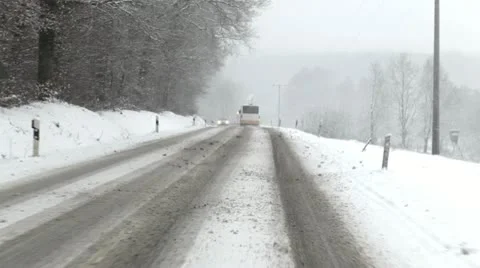 Winter road through the forest - timelapse Stockbeeldmateriaal 12763848