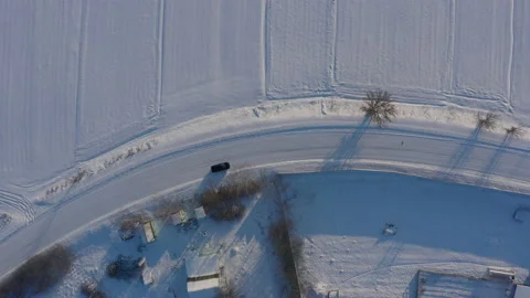 Winter road top view. long turn on a slippery snowy road. dangerous road icy Video stock 149012032
