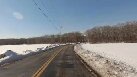Winter Road Trip through Snow covered frozen lake into forest, NY Stock Footage 149690767