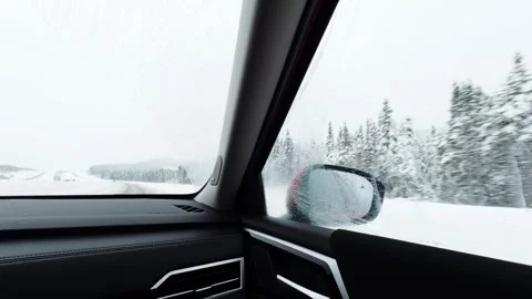 Winter road trip through snowy canadian mountains Stock Footage 327125770