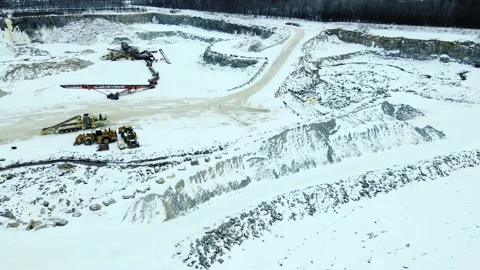 Winter rock open-pit rock quarry covered in snow Stock Footage 169973653
