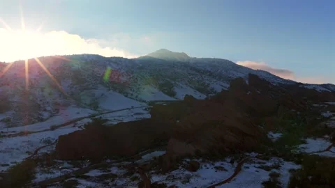 Winter on the Rocks sunset sun rays golden hour Winter Spring fresh snowy Red Stockbeeldmateriaal 336796899