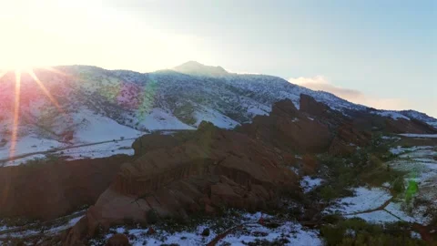 Winter on the Rocks sunset sun rays golden hour Winter Spring fresh snowy Red Stock Footage 336796995