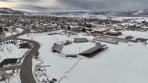 Winter at the rodeo grounds in small mountain town from drone perspective Stock Footage 229806489