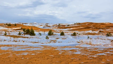 Winter sandy desert in snow time lapse scene Stock Footage 178900106