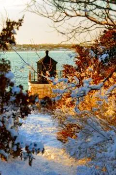 Winter scene with a Lighthouse. Stock Photos