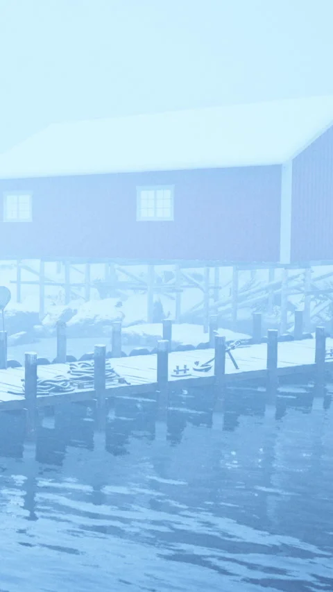 Winter scene with snow and dock near red cabin at a waterfront Stock Footage 339106301