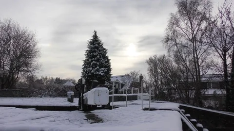 Winter scene snow canal lock moody sky Stock Footage 83389930