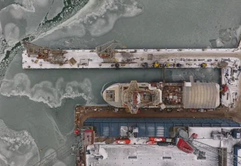 Winter scenery on a harbour Stock Photos