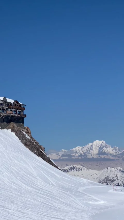 Winter scenery of le Panoramic restaurant on Courchevel la Saulire summit Stock Footage 342101302