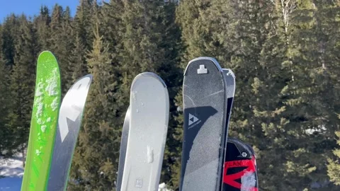 Winter scenery with skis on the gondola going up in ski lift on a snowing day Stock Footage 337053802