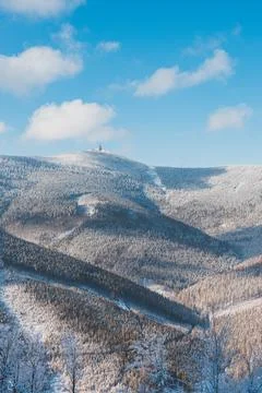 Winter scenery with sun rays reflecting off the glittering snow. Sunrise in a Stock Photos