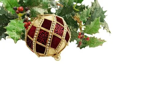 Winter setting Ruby Christmas ball with holly and berries, isolated on whi... Stock Photos