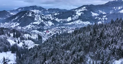 Winter shooting a mountain peak. Panoramic drone shot of beautiful scenery Stock Footage 205095302
