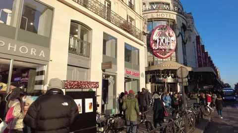 Winter shopping in Paris , crowd walking in front of the BHV mall Stock Footage 225404372