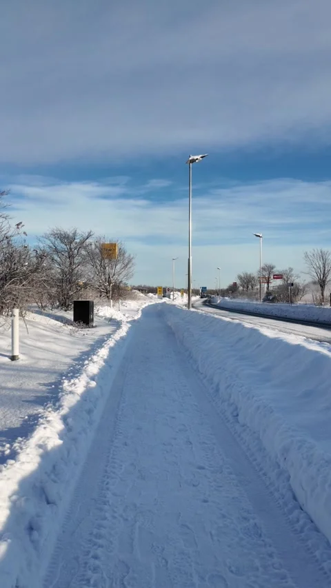 Winter Sidewalk and Road with Snow in Chitose Japan Видео 333979343