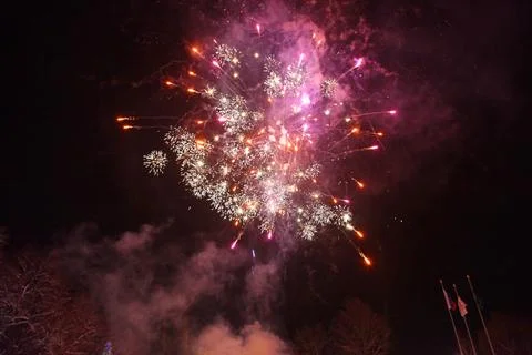 Winter sky with fireworks Stock Photos