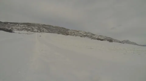 Winter sledding down a hill. Stock Footage 34335473