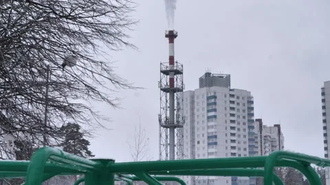 In winter, the smoke comes out of pipe. There is the marry-go-round at front end Stock Footage 277929320
