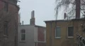 Winter with snow and wind in urban backstreet area HD Footage